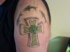 celtic cross tattoo on arm